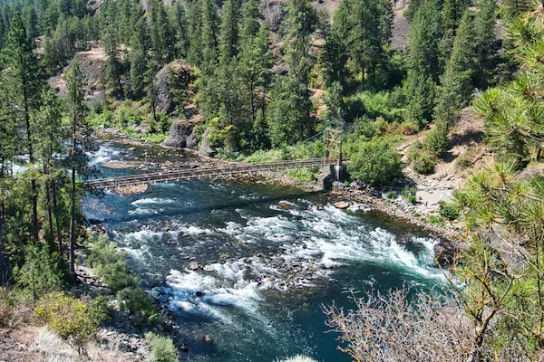 The Spokane RIver with its footbridge